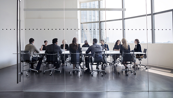 People gathered around a conference table